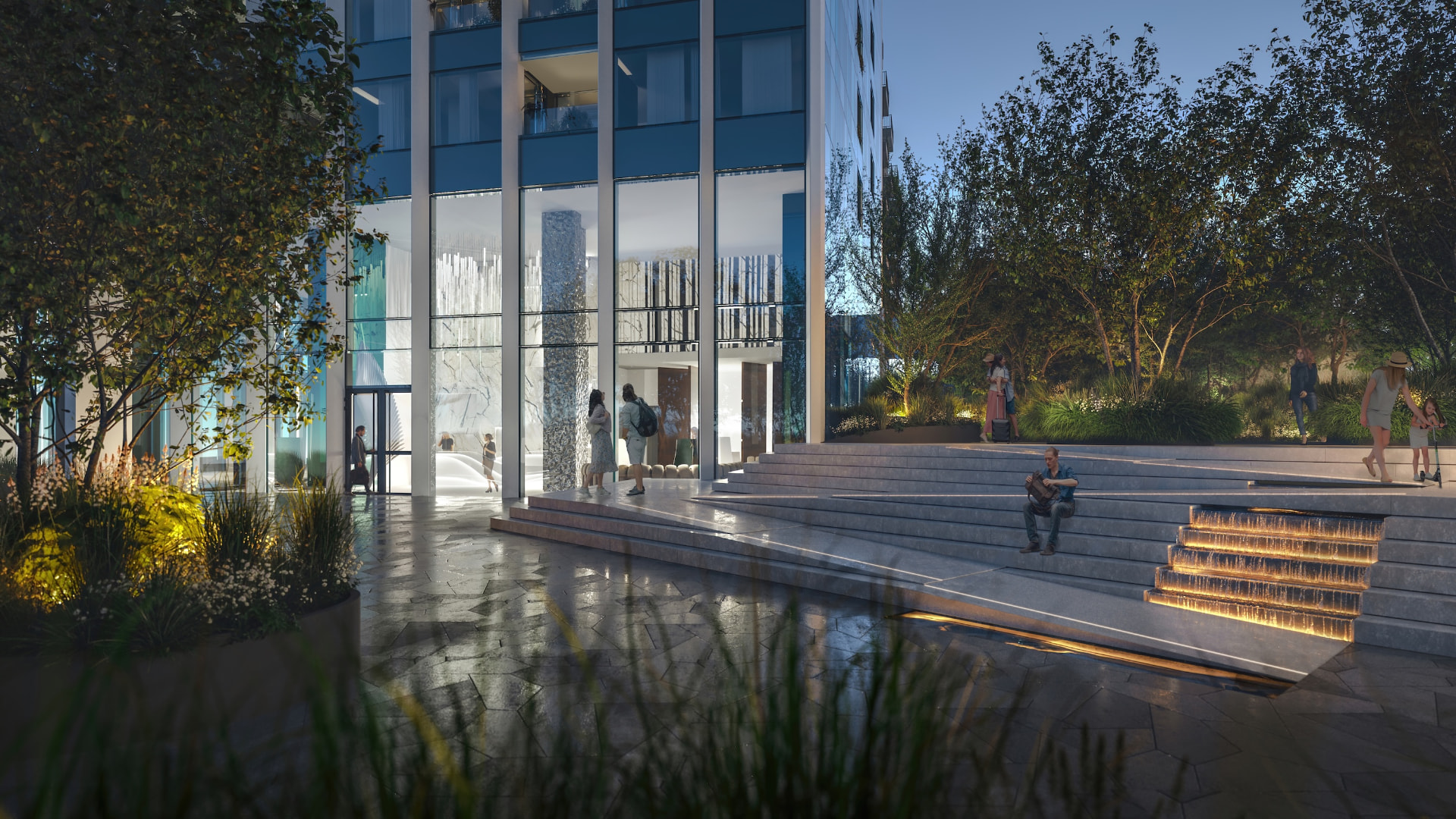 Vstupní plaza Portum Towers za podvečerního osvětlení